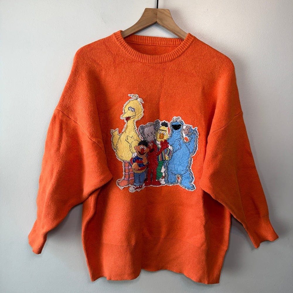 KAWS Uniqlo Sesame Street NYC Orange Knit Sweater Oversized Crewneck Streetwear